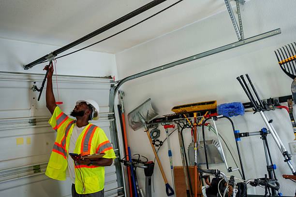 Professional Garage Door Roller Replacement technician working in Slater, MO